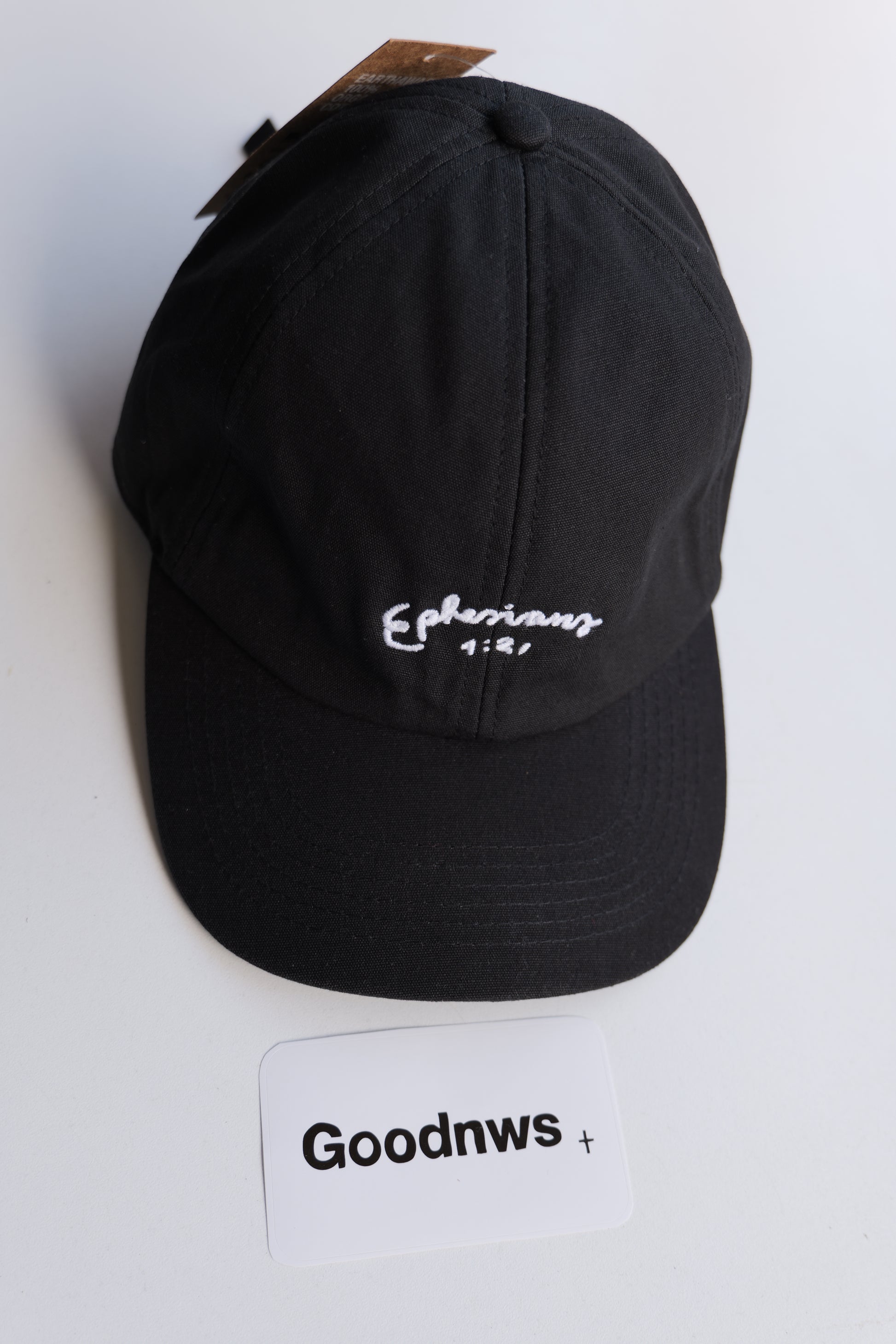 Black hat with a logo on a white background
